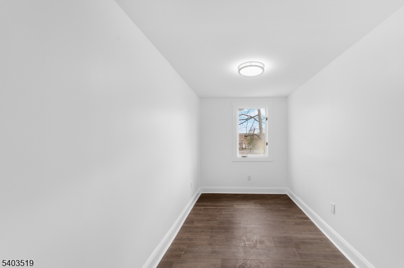 15 West Main Street Evesham, NJ 08053 - Photo 20 of 38 a view of an empty room with a window