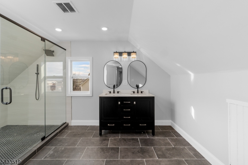 15 West Main Street Evesham, NJ 08053 - Photo 32 of 38 a living room with a couch and a mirror