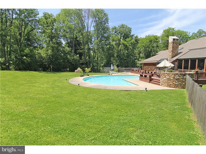 307 Oxford Road Villanova, PA 19085 - Photo 15 of 25 a view of a backyard with a patio