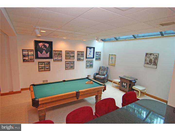 307 Oxford Road Villanova, PA 19085 - Photo 22 of 25 a room with pool table and two windows