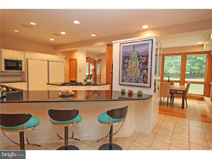 307 Oxford Road Villanova, PA 19085 - Photo 10 of 25 a kitchen with a table and chairs