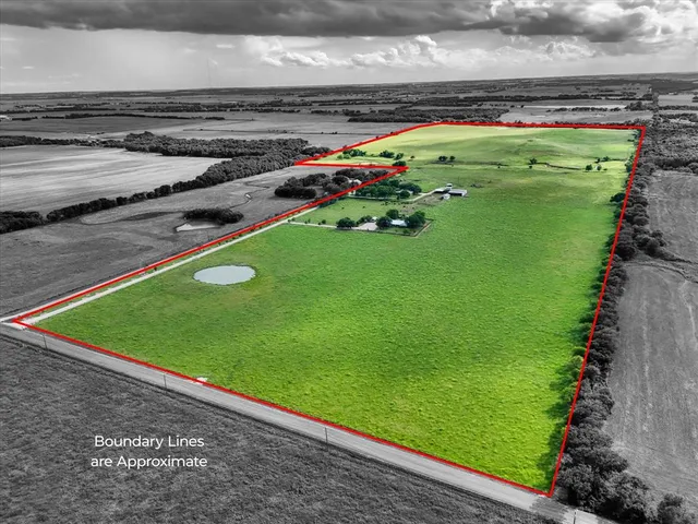 a view of a golf course with a lake view