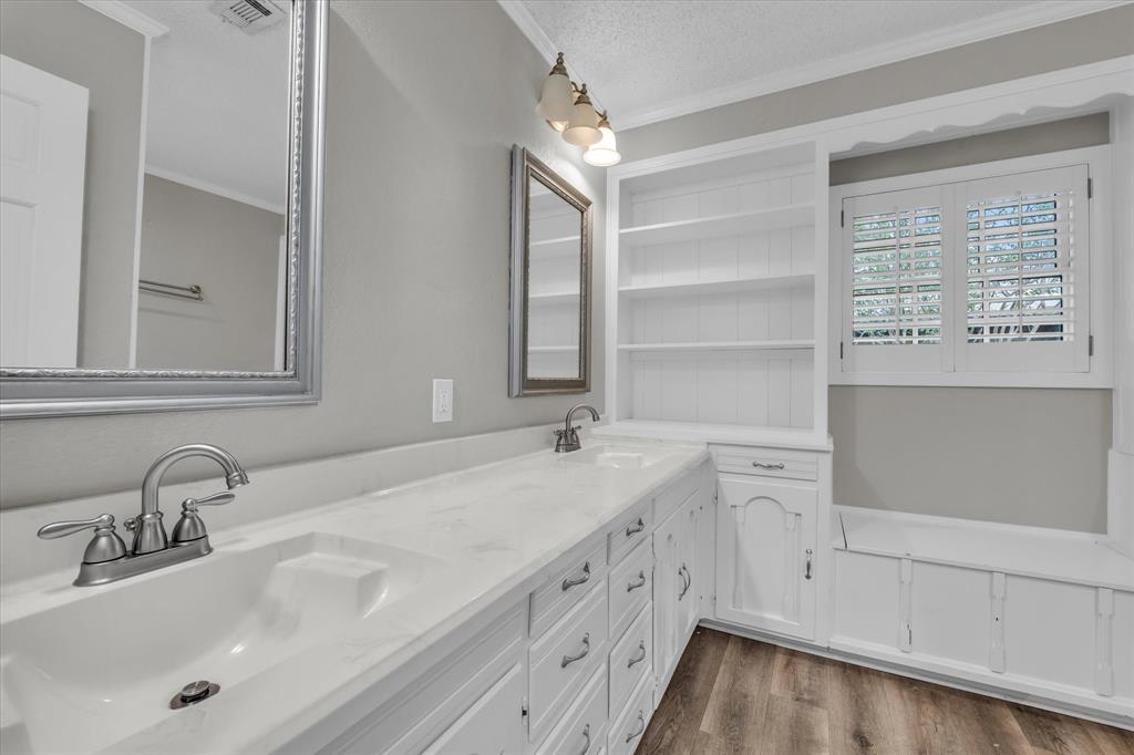 15796 Chapel Road Lorena, TX 76655 - Photo 13 of 34 a bathroom with a sink and a mirror