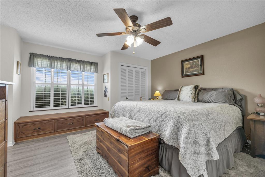 15796 Chapel Road Lorena, TX 76655 - Photo 23 of 34 a bedroom with a bed and window