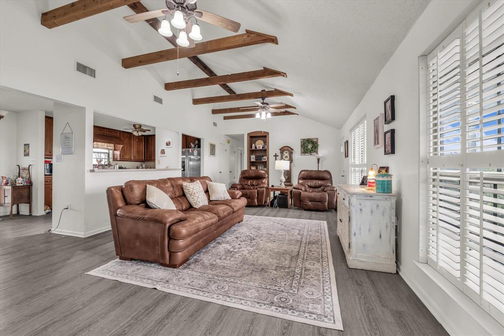 15796 Chapel Road Lorena, TX 76655 - Photo 25 of 34 a living room with furniture and a wooden floor