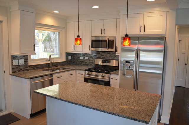 1130 Whitfield Road Northbrook, IL 60062 - Photo 2 of 25 a kitchen with stainless steel appliances granite countertop a stove a sink and a refrigerator