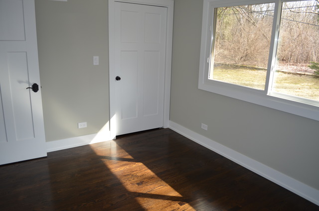1130 Whitfield Road Northbrook, IL 60062 - Photo 12 of 25 an empty room with wooden floor and windows