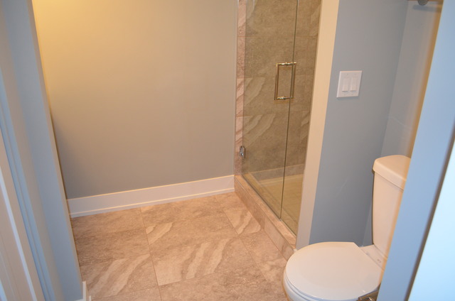 1130 Whitfield Road Northbrook, IL 60062 - Photo 17 of 25 a bathroom with a sink and a toilet