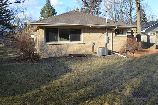 1130 Whitfield Road Northbrook, IL 60062 - Photo 23 of 25 a house with trees in the background