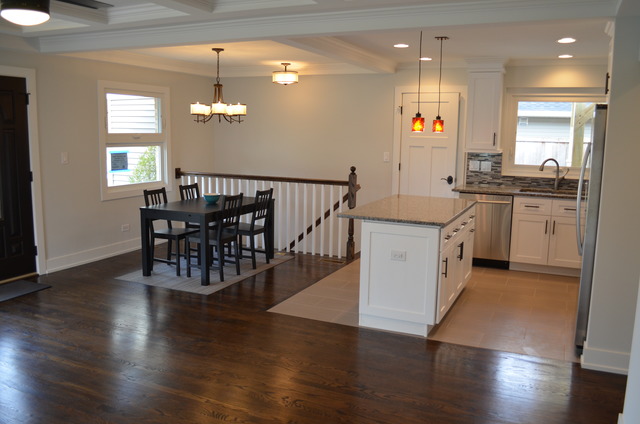 1130 Whitfield Road Northbrook, IL 60062 - Photo 6 of 25 a kitchen with stainless steel appliances granite countertop a stove top oven a sink dishwasher and a refrigerator with wooden floor