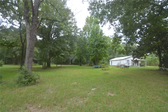 $195,000 | 1120 Cherry Creek Drive South, Shepherd, TX 77371