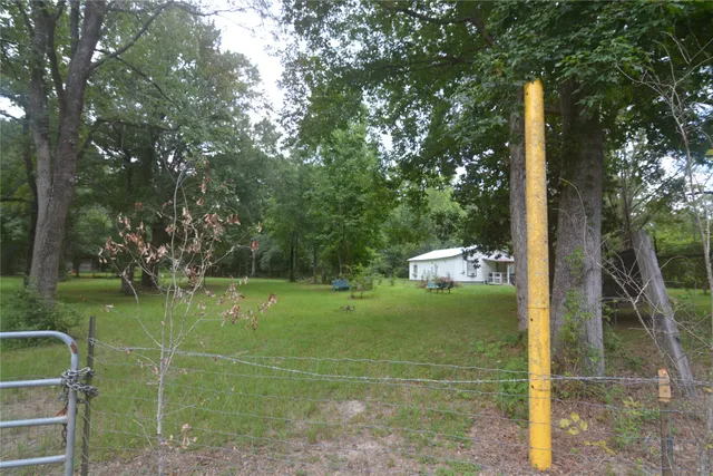 $195,000 | 1120 Cherry Creek Drive South, Shepherd, TX 77371