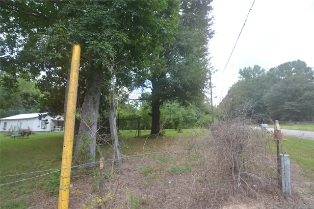 $195,000 | 1120 Cherry Creek Drive South, Shepherd, TX 77371