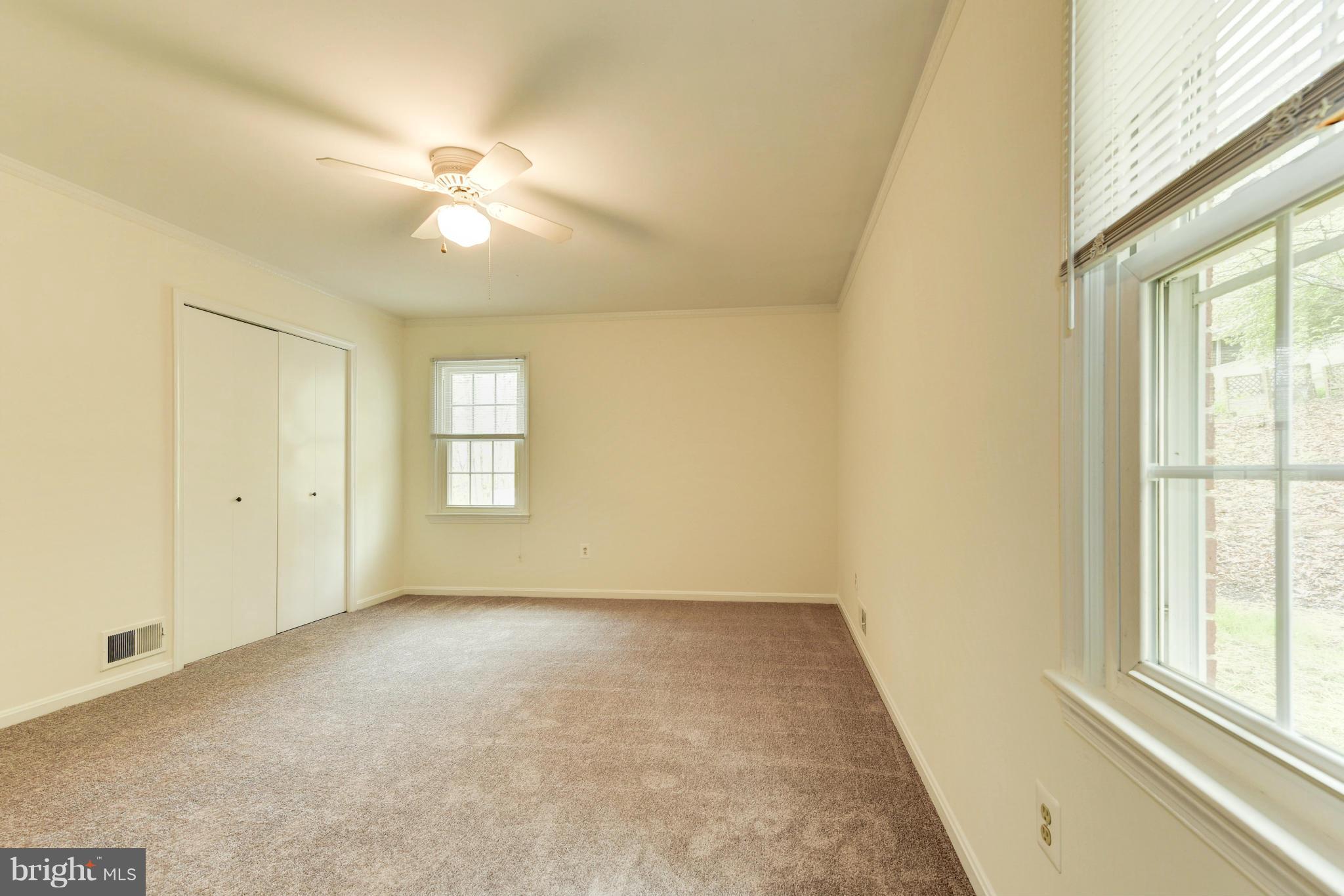 8030 Devlin Road Bristow, VA 20136 - Photo 14 of 27 Master Bedroom with Beautiful View of Backyard