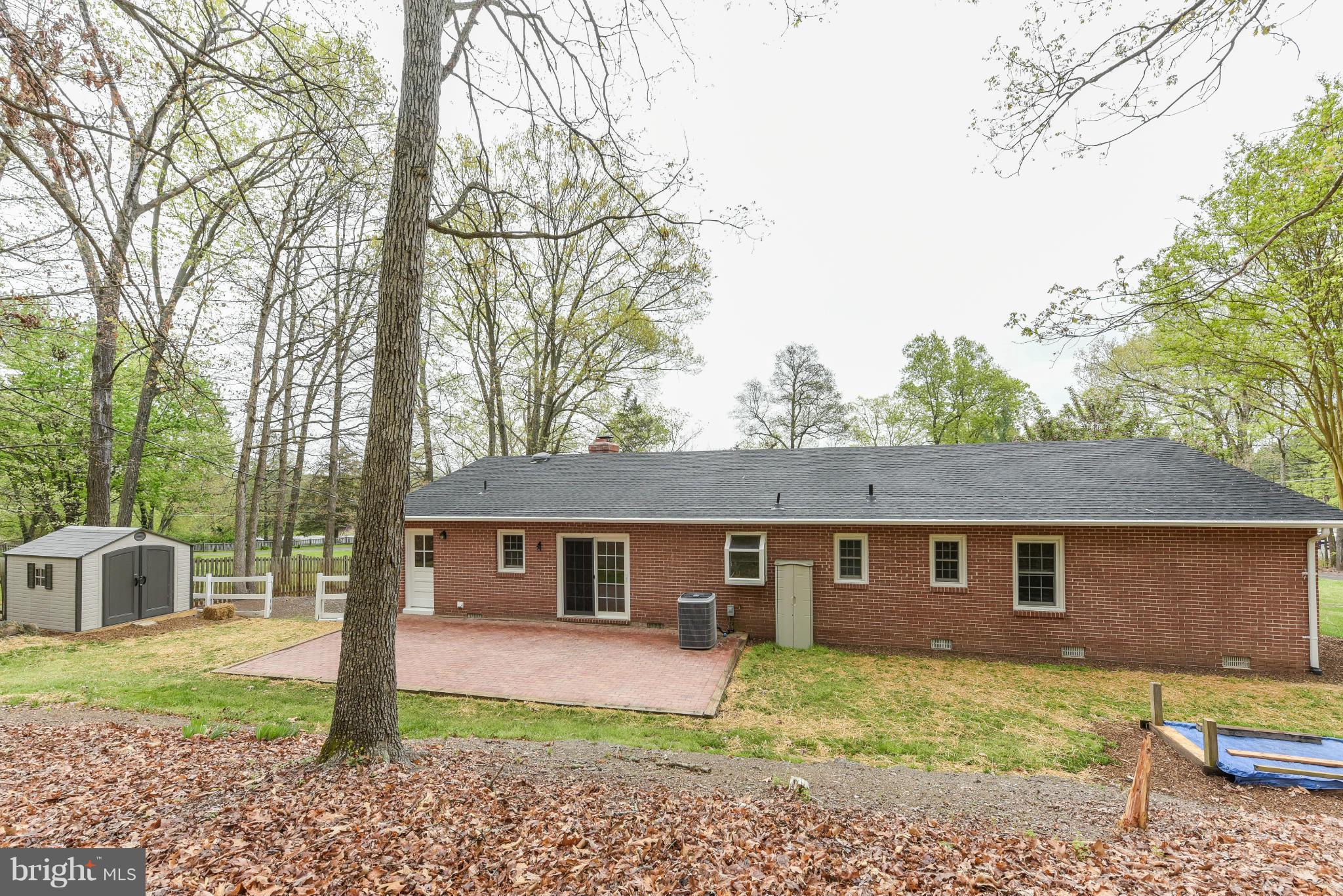 8030 Devlin Road Bristow, VA 20136 - Photo 23 of 27 Expansive Brick Patio