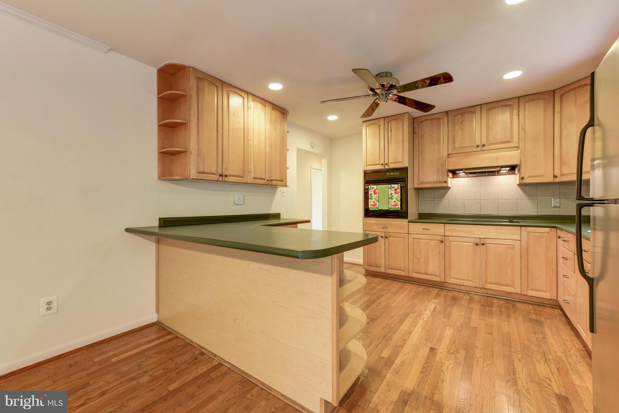8030 Devlin Road Bristow, VA 20136 - Photo 26 of 27 Open Floor Plan Kitchen and Dining