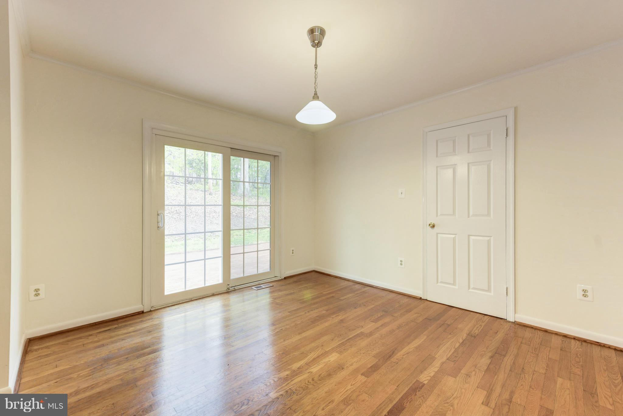 8030 Devlin Road Bristow, VA 20136 - Photo 9 of 27 Gorgeous Hardwood in Dining Area