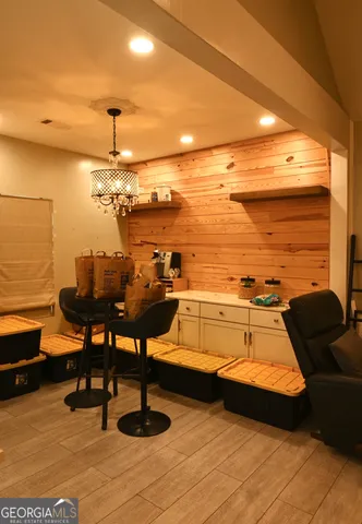 a view of a swimming pool with seating area