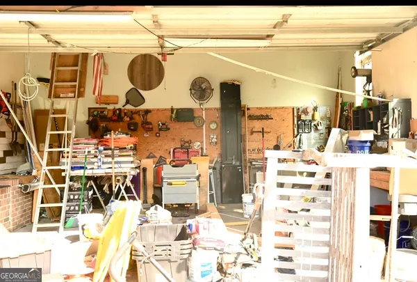 a picture of a bathroom with a sink and mirror