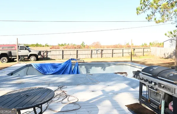 a view of a balcony with chairs