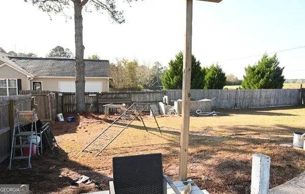 a view of swimming pool with patio