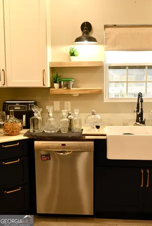 a kitchen with a sink and a window