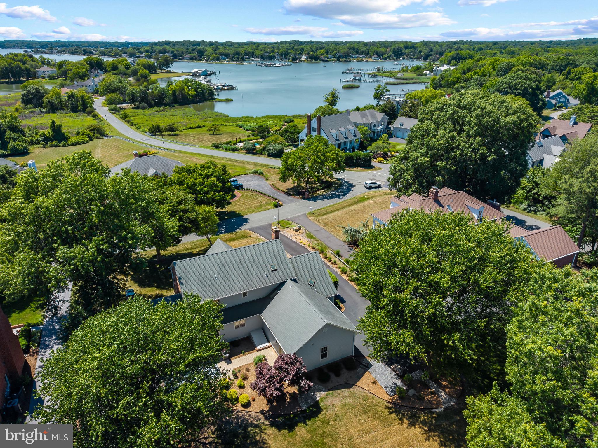 3403 Hidden River View Road Annapolis, MD 21403 - Photo 39 of 50 an aerial view of a house with outdoor space and a lake view
