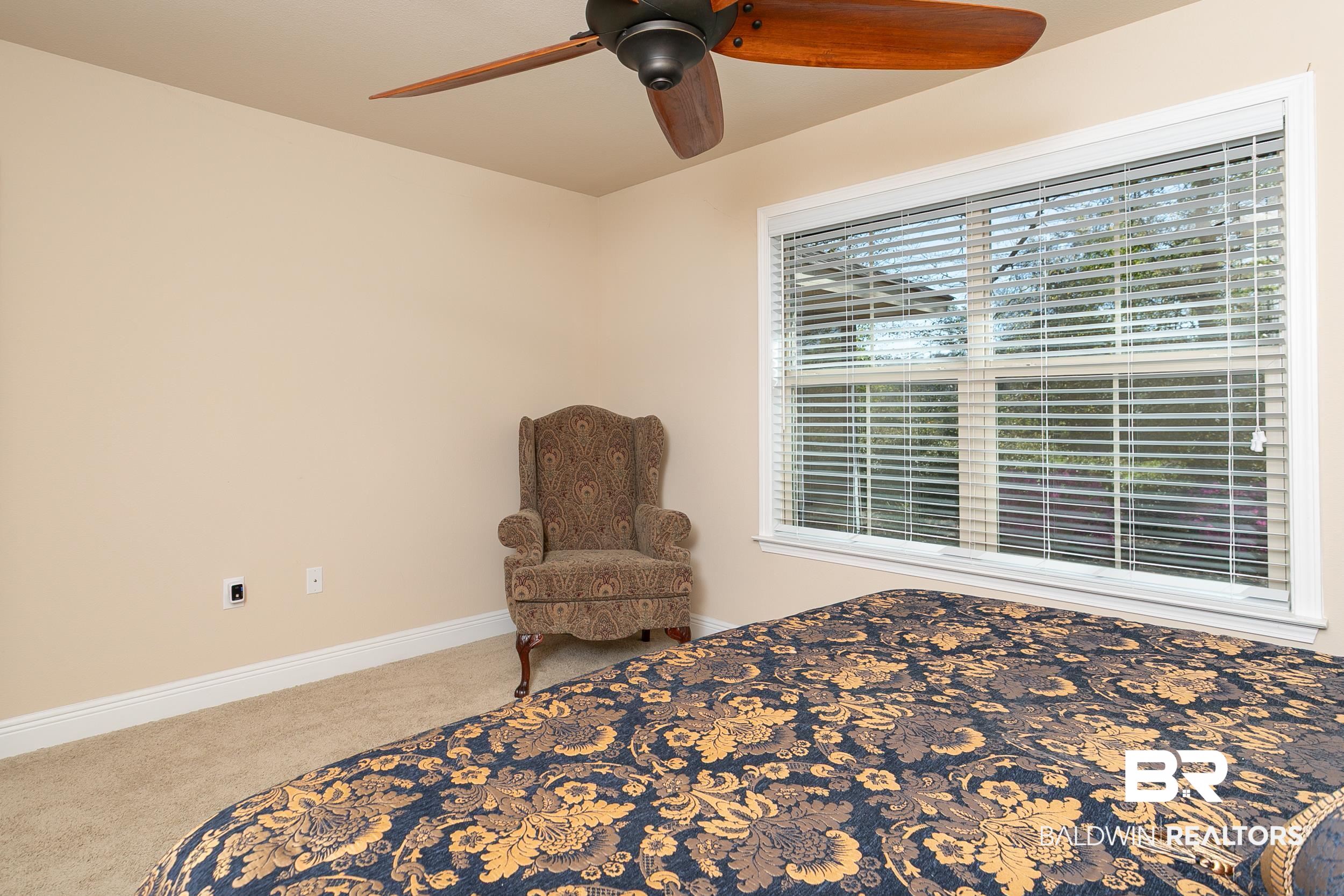 13154 Vincent Court Foley, AL 36535 - Photo 27 of 41 Bedroom with baseboards, a ceiling fan, and carpet