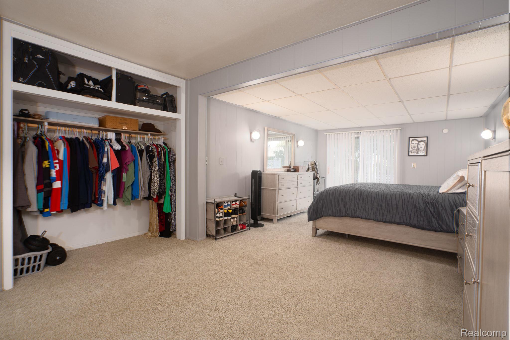 9041 Rackham Street Taylor, MI 48180 - Photo 28 of 34 Recessed closet with upper shelving and hanging rods