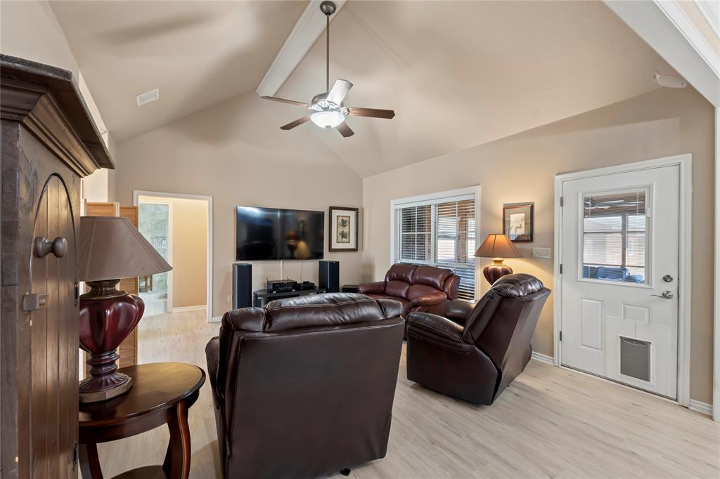 104 Blake Avenue Mabank, TX 75147 - Photo 9 of 29 Additional Living Room View w/ Back Door access to the Screened Porch