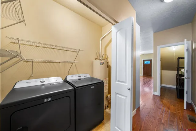a utility room with dryer and washer