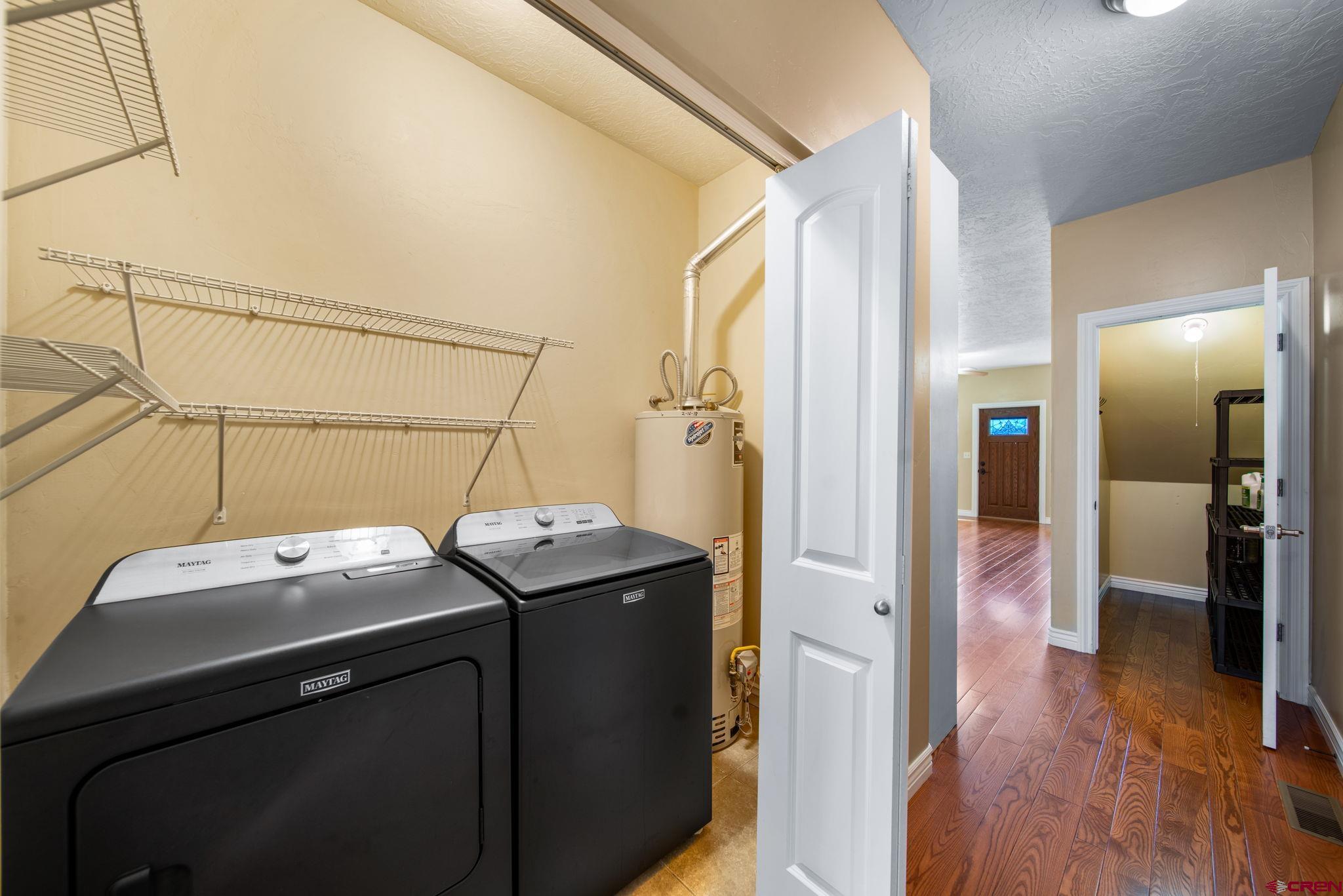 1630 Gateway Drive, Unit 3 Cortez, CO 81321 - Photo 14 of 34 a utility room with dryer and washer