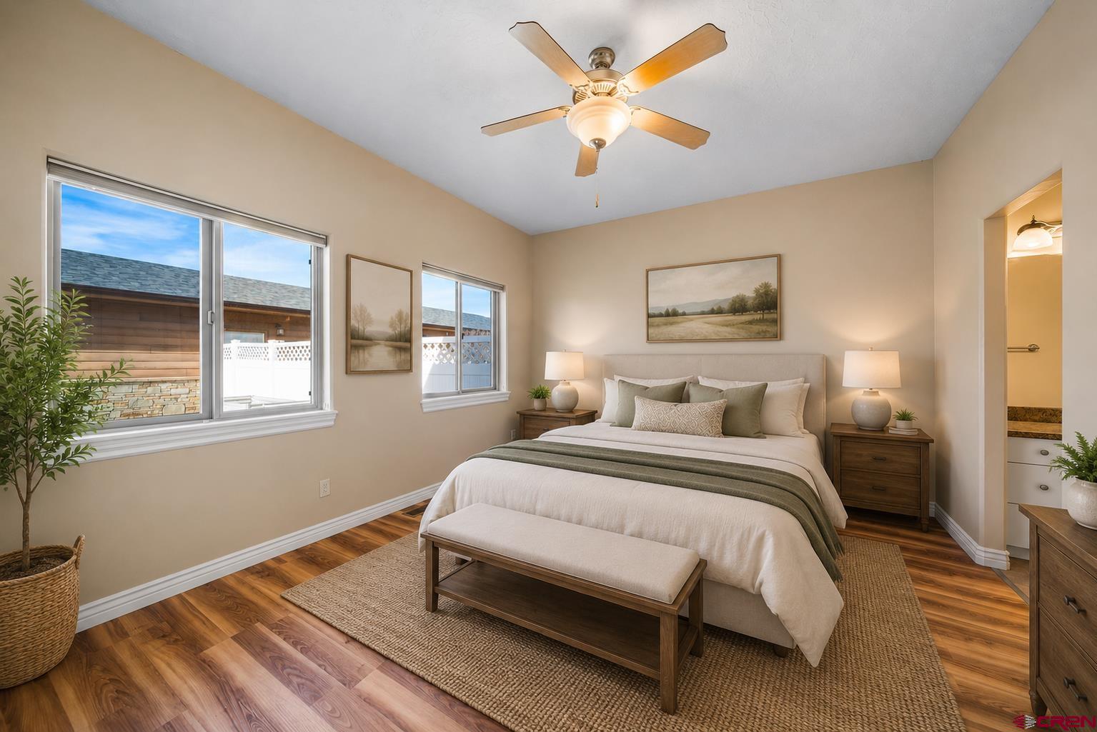1630 Gateway Drive, Unit 3 Cortez, CO 81321 - Photo 15 of 34 a spacious bedroom with a bed and a window