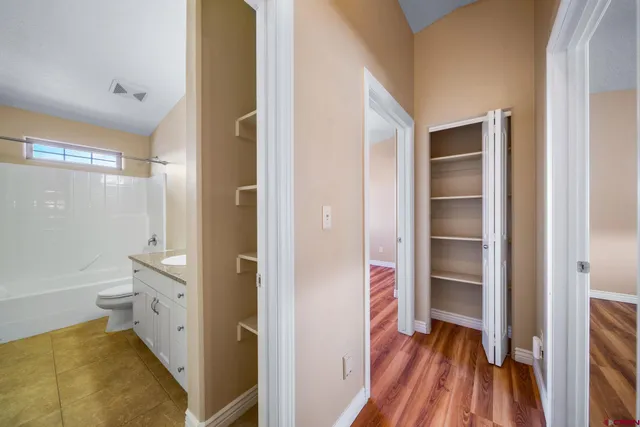 a view of bathroom with a toilet and a shower