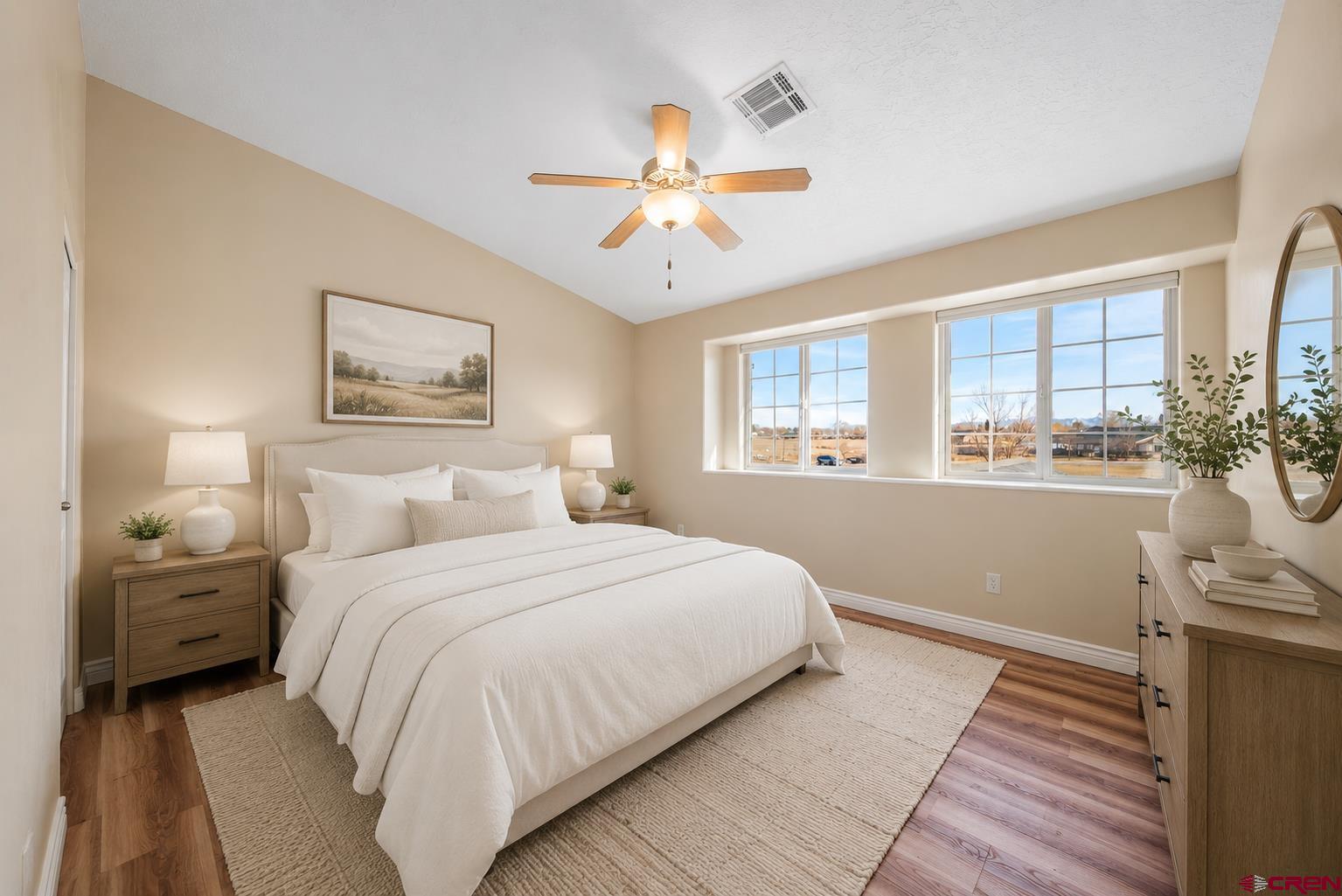 1630 Gateway Drive, Unit 3 Cortez, CO 81321 - Photo 20 of 34 a bedroom with a large bed and a window