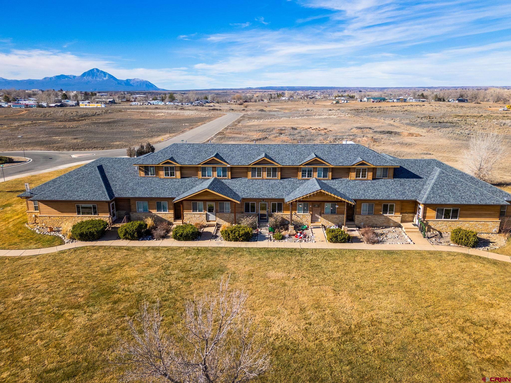1630 Gateway Drive, Unit 3 Cortez, CO 81321 - Photo 3 of 34 an aerial view of a building with an ocean view