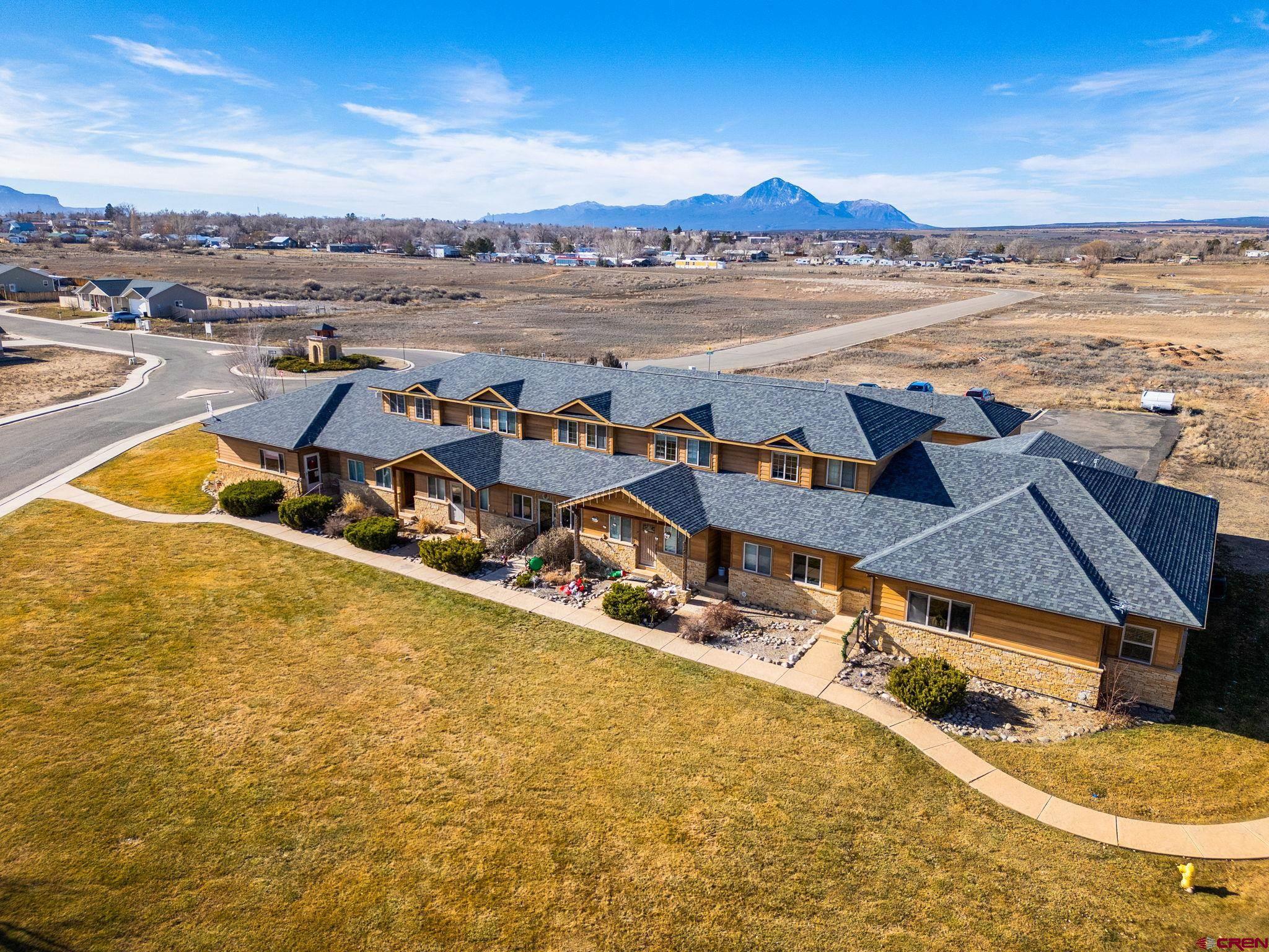 1630 Gateway Drive, Unit 3 Cortez, CO 81321 - Photo 33 of 34 an aerial view of a house with outdoor space swimming pool and ocean view