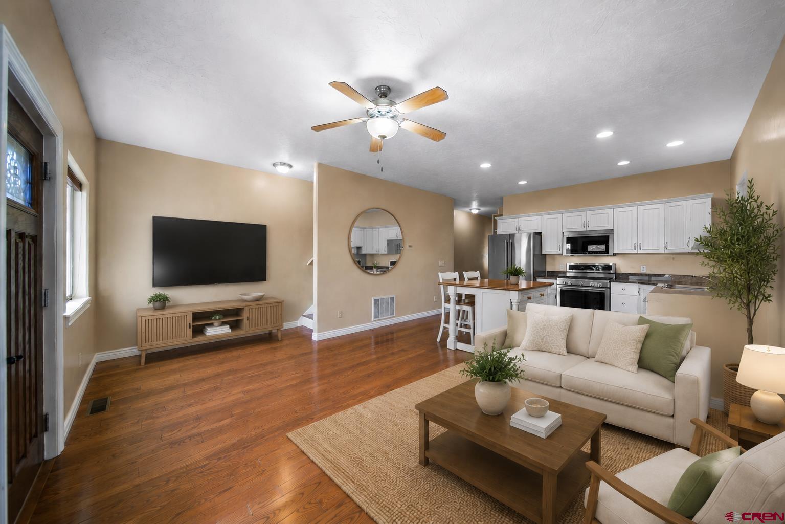 1630 Gateway Drive, Unit 3 Cortez, CO 81321 - Photo 5 of 34 a living room with furniture and a flat screen tv