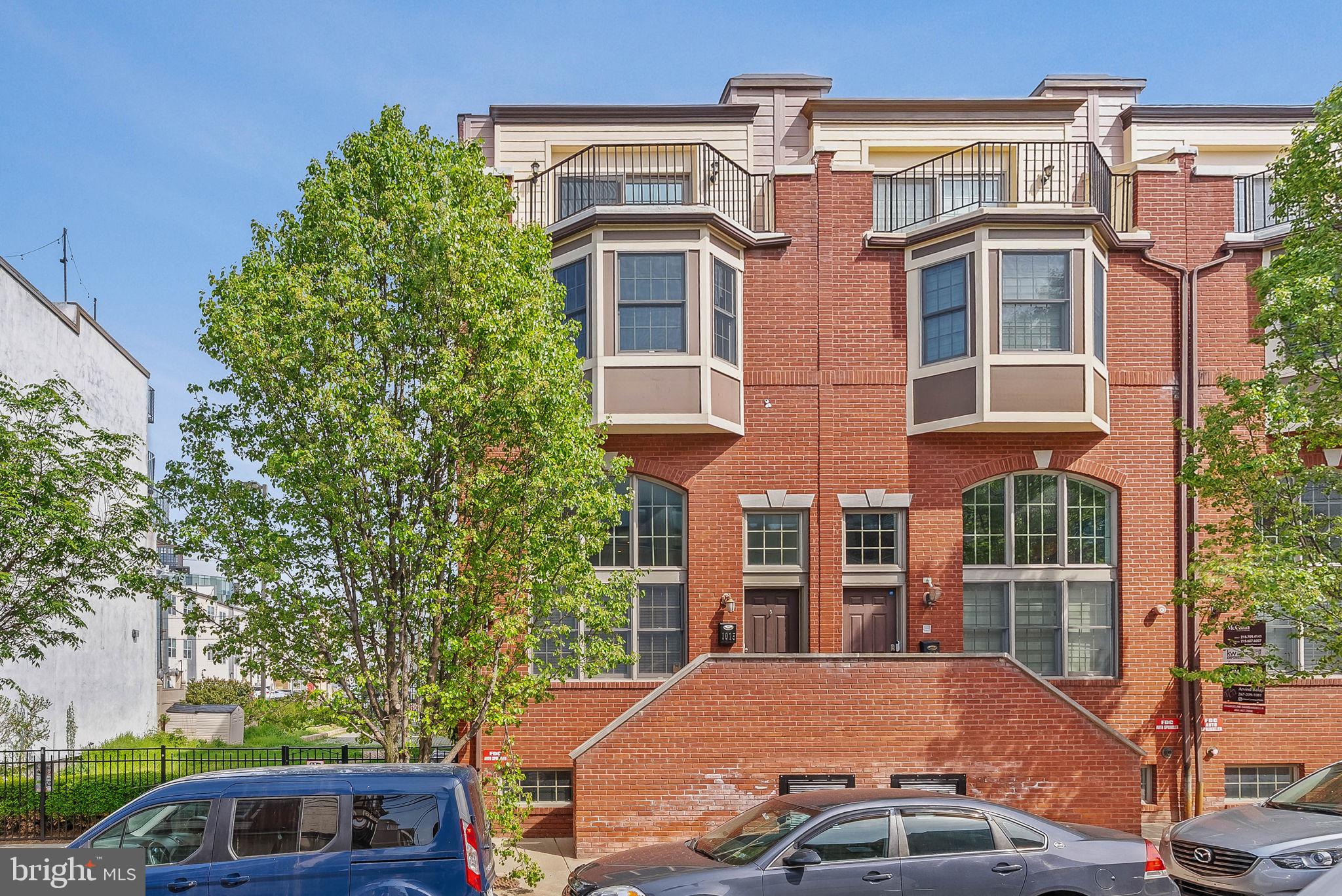 1015 North 3rd Street, Unit H Philadelphia, PA 19123 - Photo 27 of 27 a front view of a building with parking space