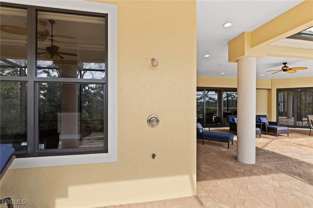6057 Calusa Rdg Trail Bokeelia, FL 33922 - Photo 29 of 45 a view of a bathroom with a tub and shower
