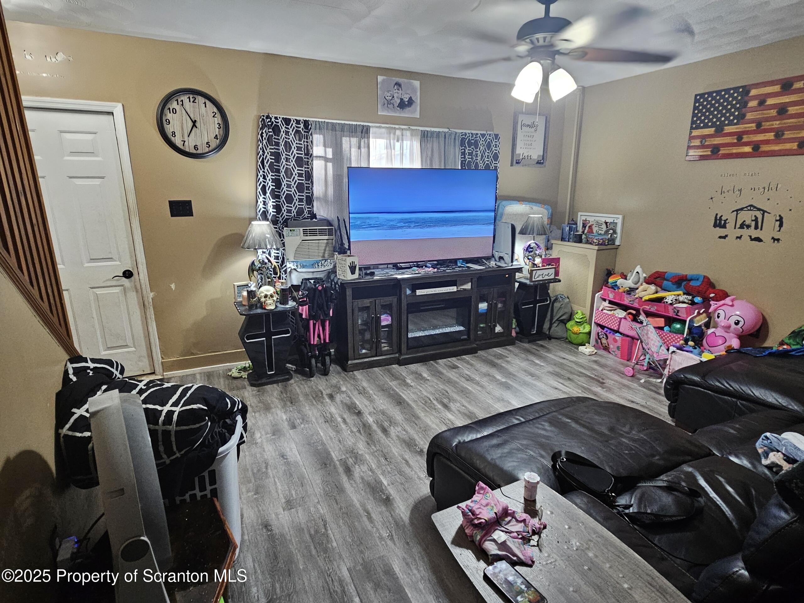 139 Terrace Street Carbondale, PA 18407 - Photo 5 of 9 a bedroom with furniture and a mirror
