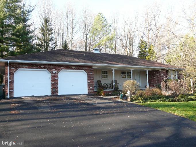 791 Hilltop Road Elkton, MD 21921 - Photo 1 of 20 a front view of a house with garden