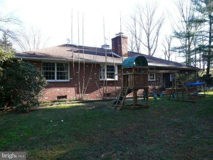 791 Hilltop Road Elkton, MD 21921 - Photo 16 of 20 a front view of a house with a garden