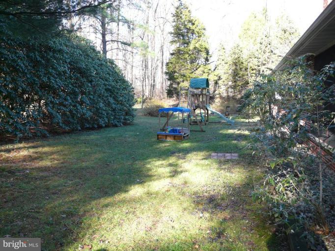 791 Hilltop Road Elkton, MD 21921 - Photo 17 of 20 a small garden with trees