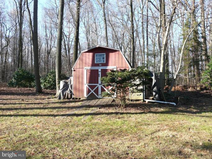 791 Hilltop Road Elkton, MD 21921 - Photo 18 of 20 a view of a house with backyard and trees