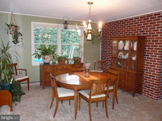 791 Hilltop Road Elkton, MD 21921 - Photo 4 of 20 a dining room with furniture and window