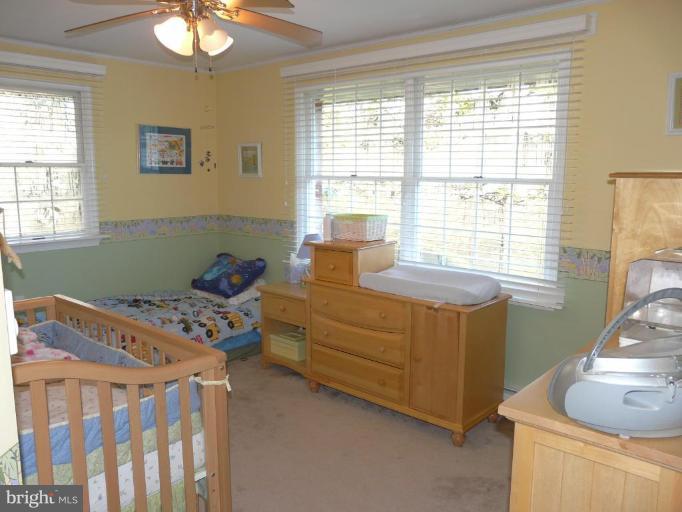 791 Hilltop Road Elkton, MD 21921 - Photo 7 of 20 a bedroom with bed and a window