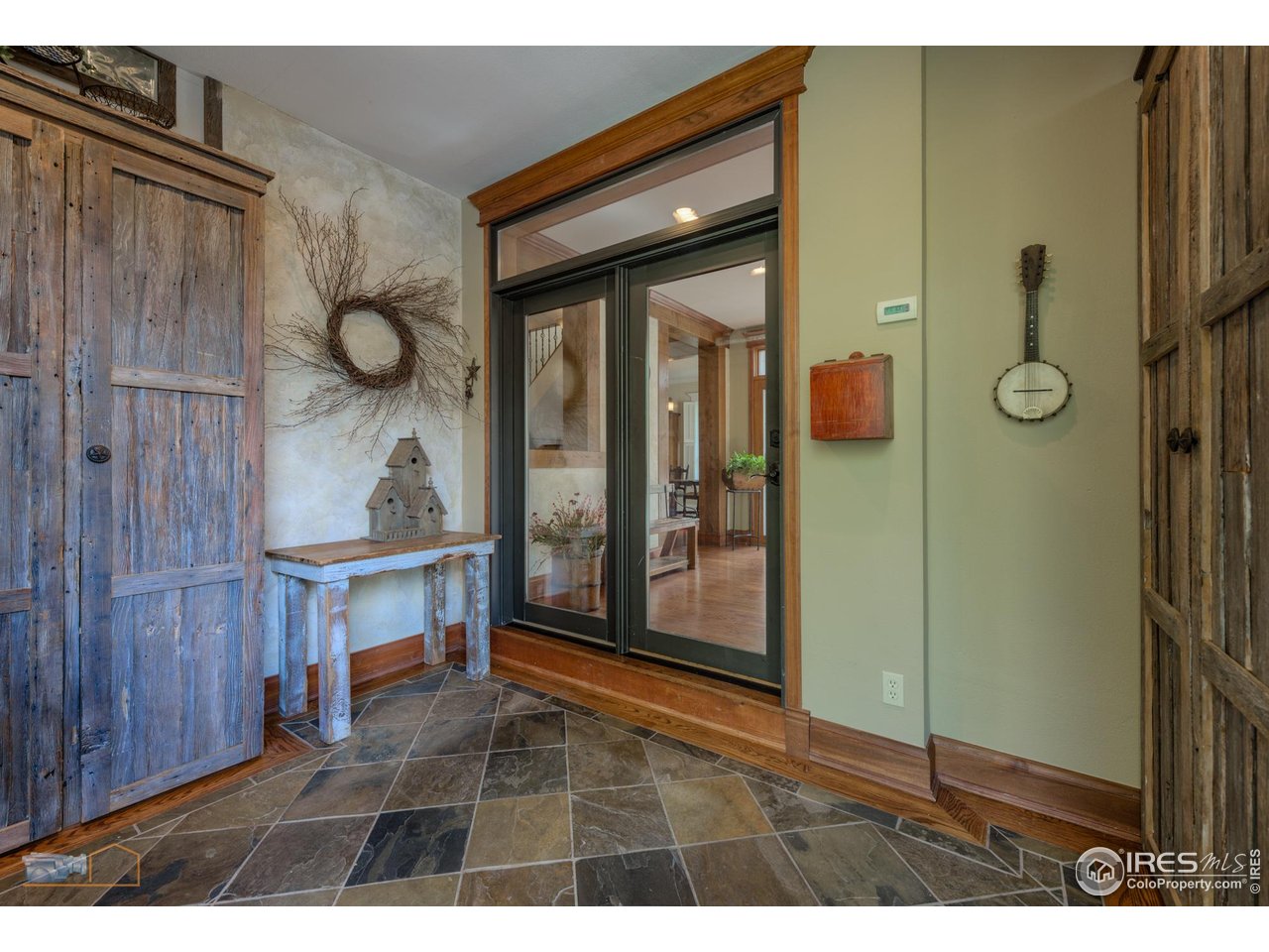 3737 26th Street Boulder, CO 80304 - Photo 10 of 47 Foyer with barn wood built-in storage