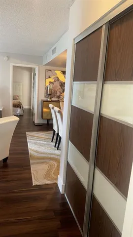 a view of living room with furniture and a window