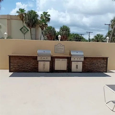 a view of water heater and wooden fence